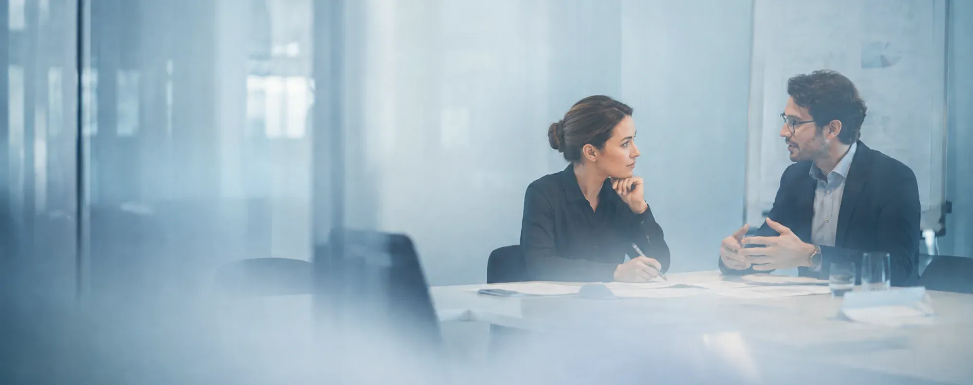 Two colleagues in conversation